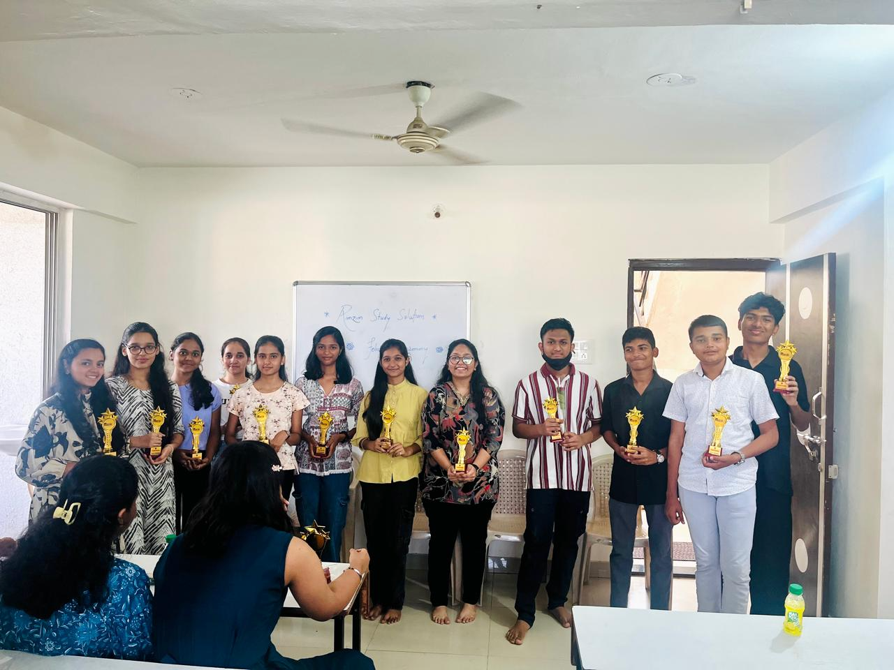 Students participating in a classroom event